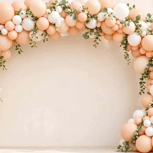 Peach balloon garland kit styled for a wedding table